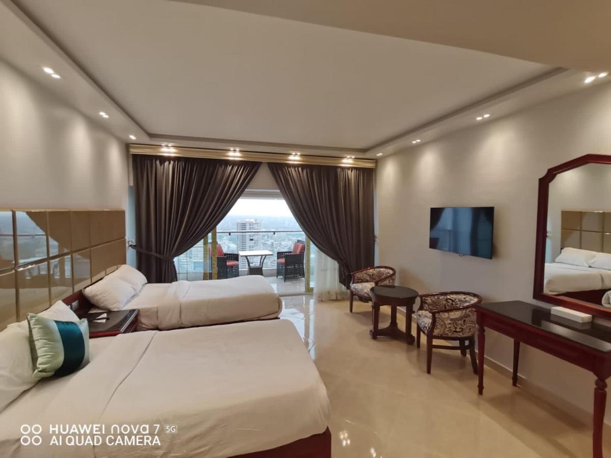 Отель Pyramids Nile Tower Каир Экстерьер фото
